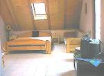 Living-room with sleeping corner